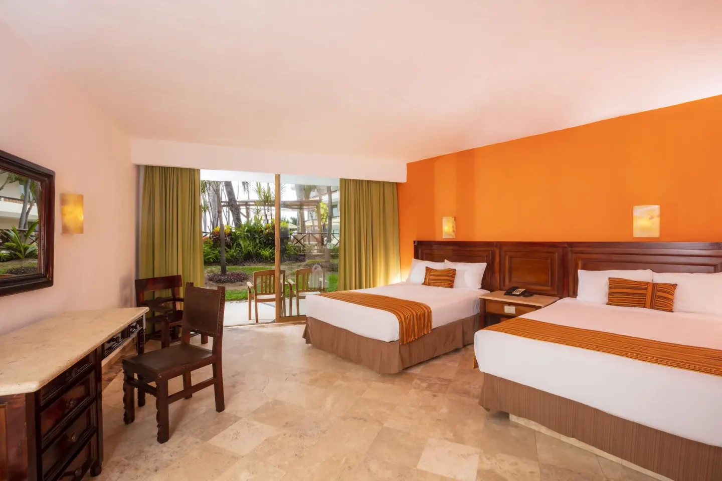 Standard terrace room with two double beds and outdoor chairs at Las Palmas by the Sea.