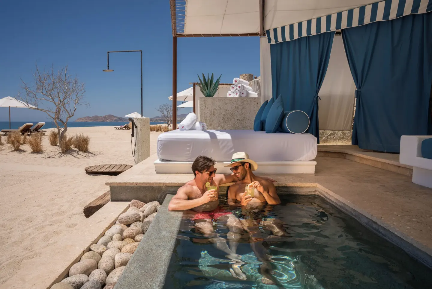 Beach cabana plunge pool with two guests at Las Ventanas al Paraiso.