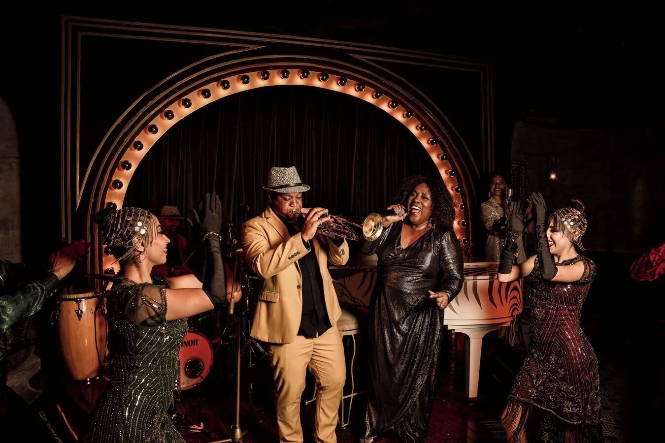 Live musicians and dancers perform on a small stage at Las Ventanas al Paraiso.