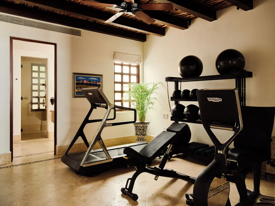 In-villa fitness room with treadmill and weights at Las Ventanas al Paraiso.