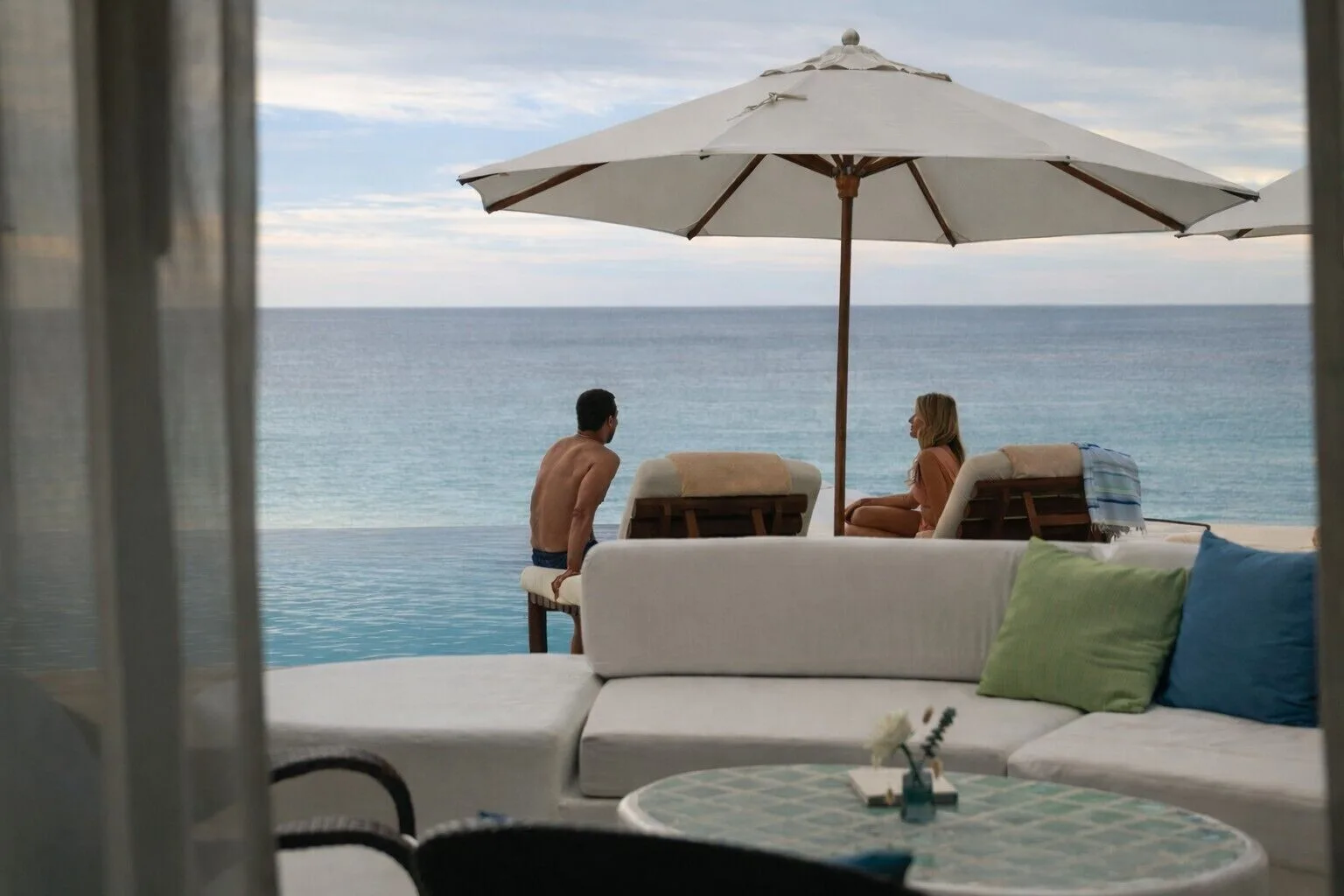 Oceanfront terrace seating and pool edge at Las Ventanas al Paraiso.
