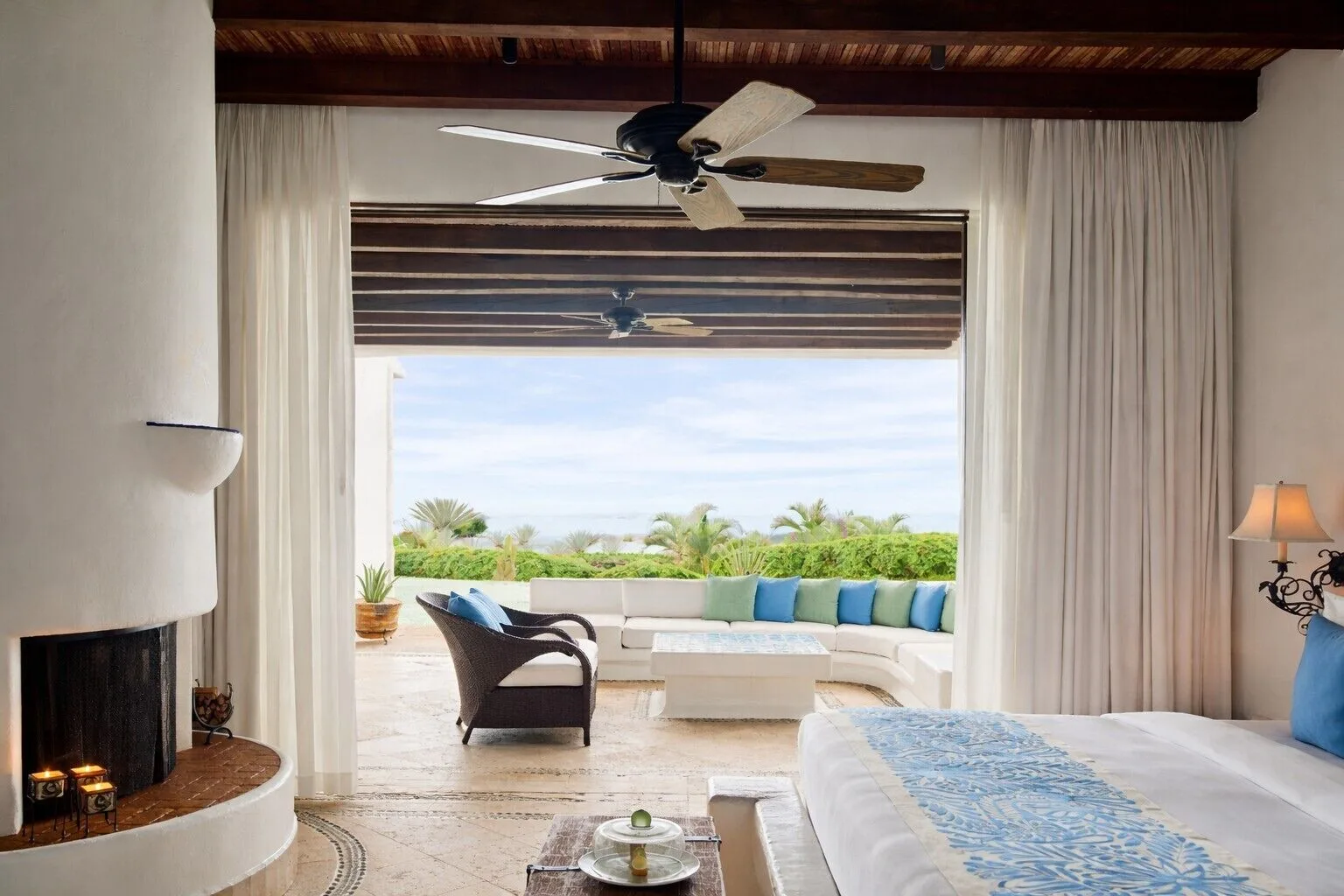 Oceanview Junior Suite bedroom opening to a terrace at Las Ventanas al Paraiso.