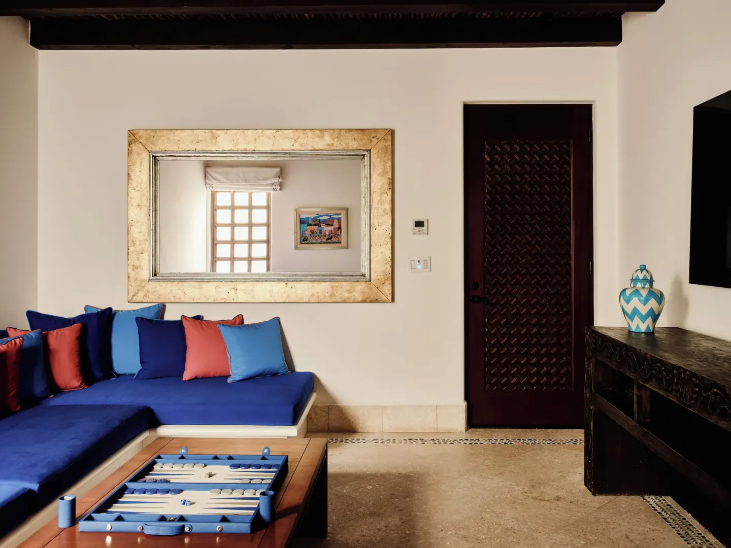 Blue-cushioned living room in an oceanview villa at Las Ventanas al Paraiso.