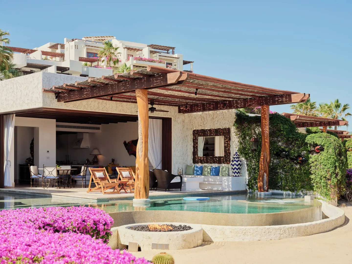 Private villa pool terrace with shaded seating at Las Ventanas al Paraiso.