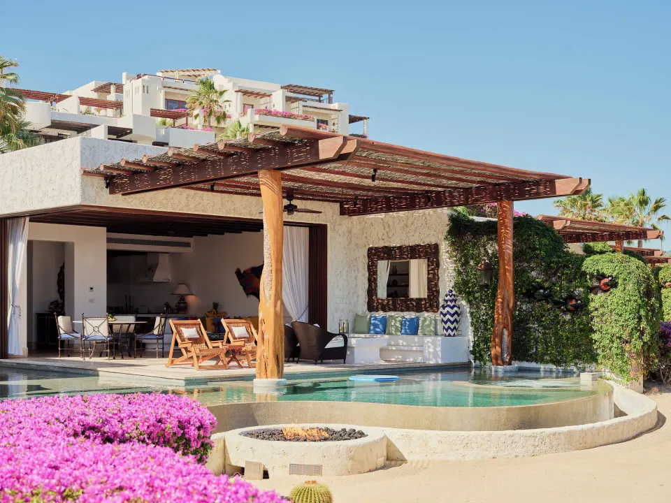 Private villa pool terrace with shaded seating at Las Ventanas al Paraiso.