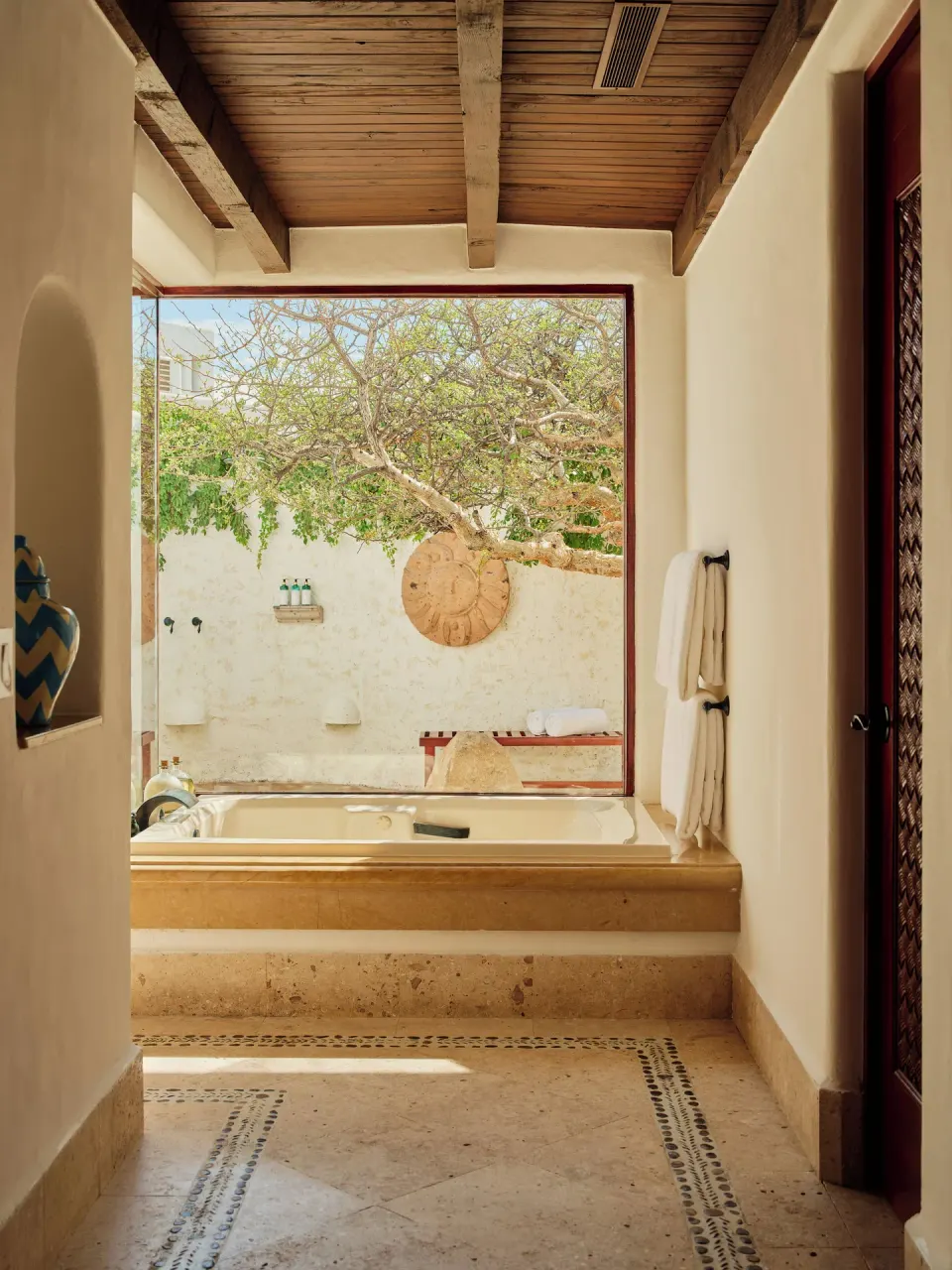 One Bedroom Oceanview Villa bathroom with tub and outdoor shower at Las Ventanas al Paraiso.