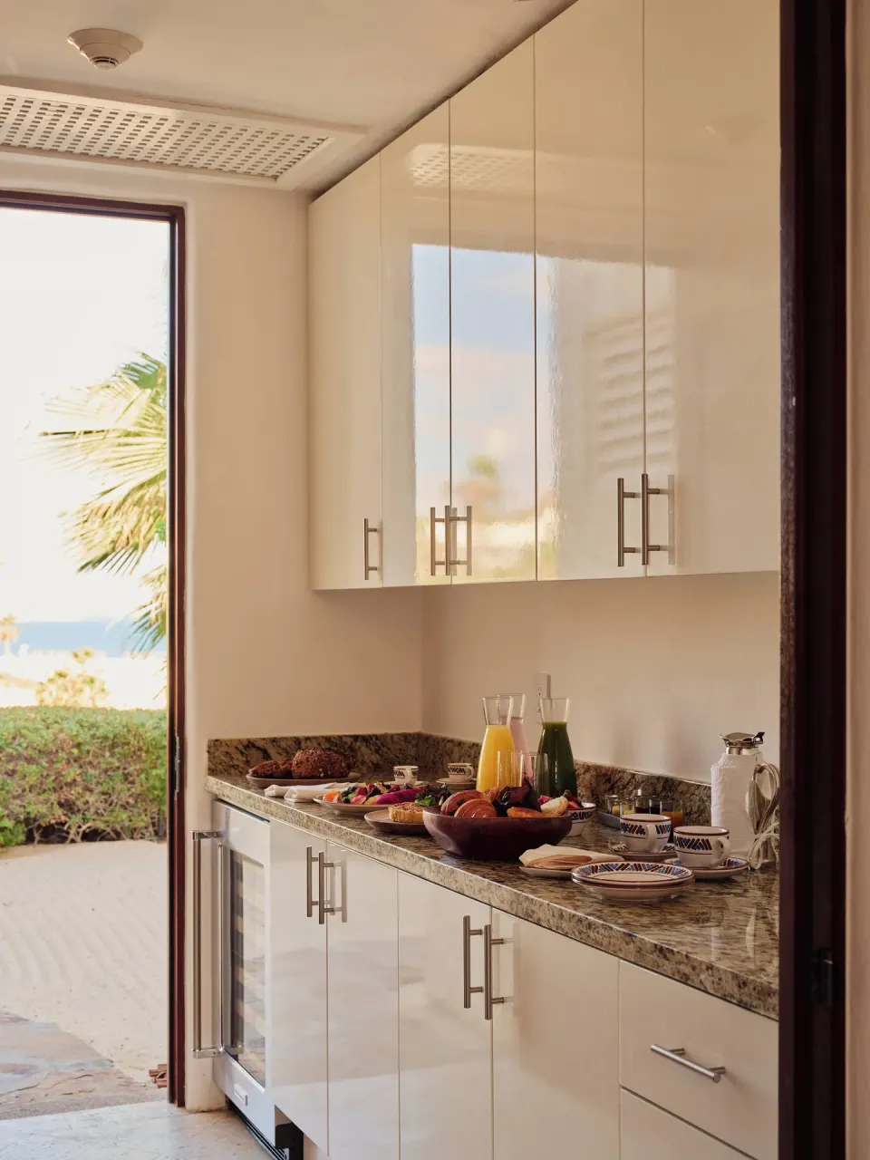 One Bedroom Oceanview Villa kitchenette with breakfast setup at Las Ventanas al Paraiso.