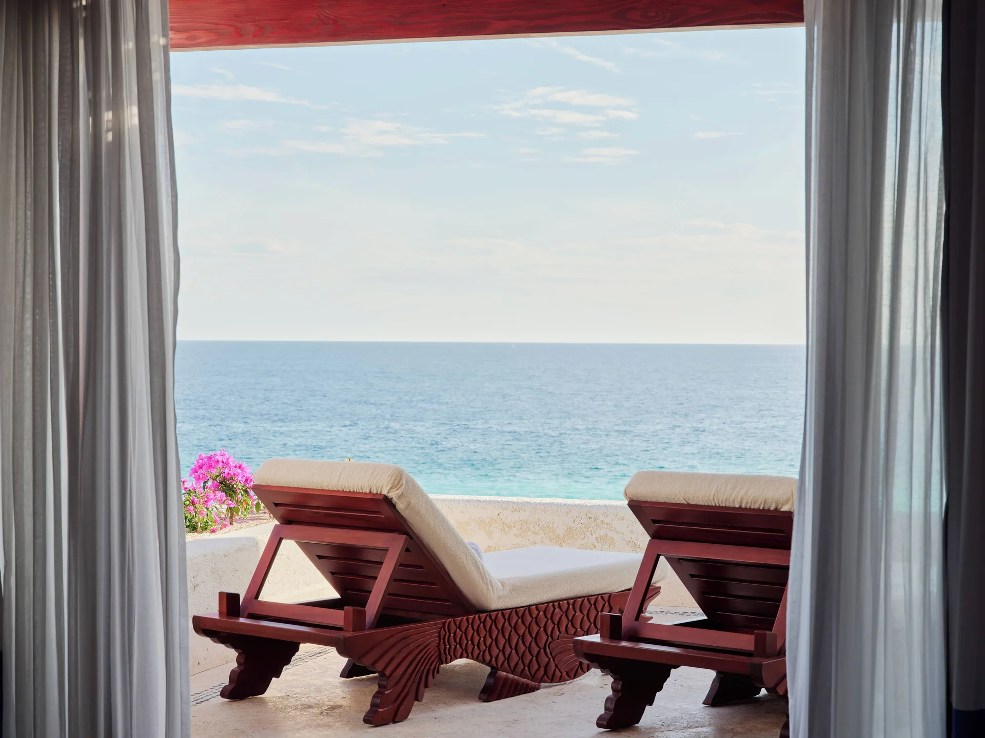 Terrace loungers in the Three Bedroom Oceanview Villa at Las Ventanas al Paraiso overlooking the ocean.