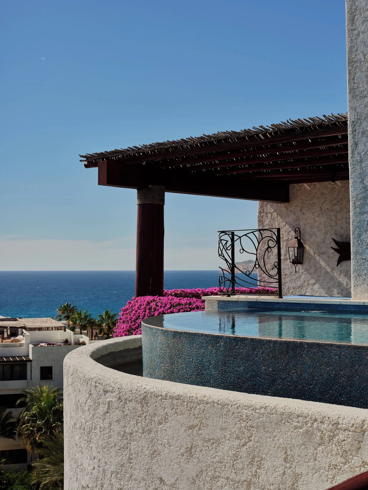Curved rooftop plunge pool overlooking the ocean at Las Ventanas al Paraiso.