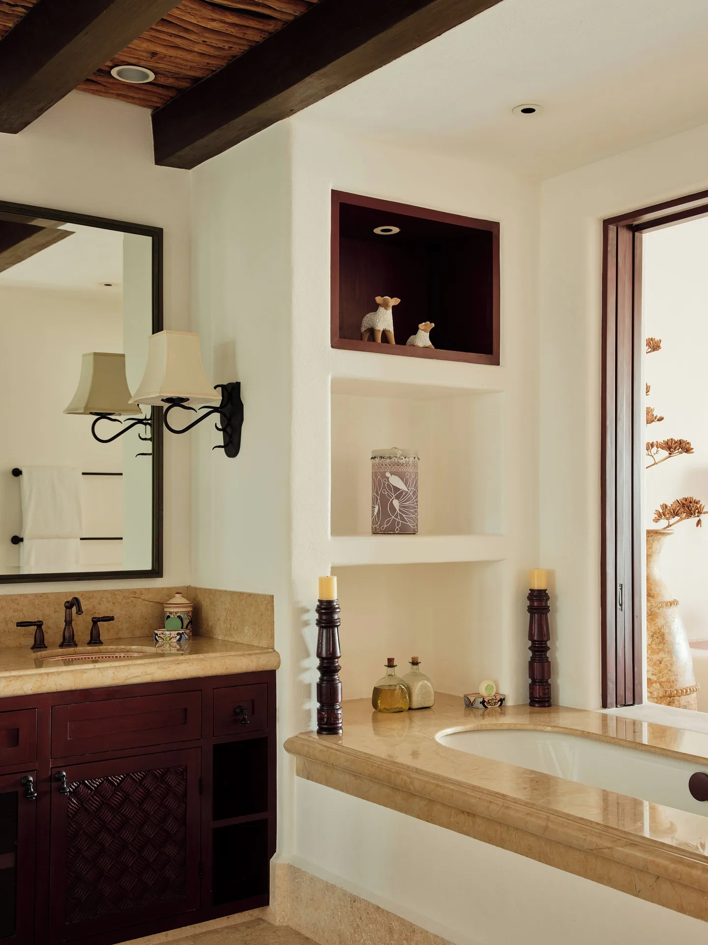 Bathroom vanity and soaking tub in a residence at Las Ventanas al Paraiso.