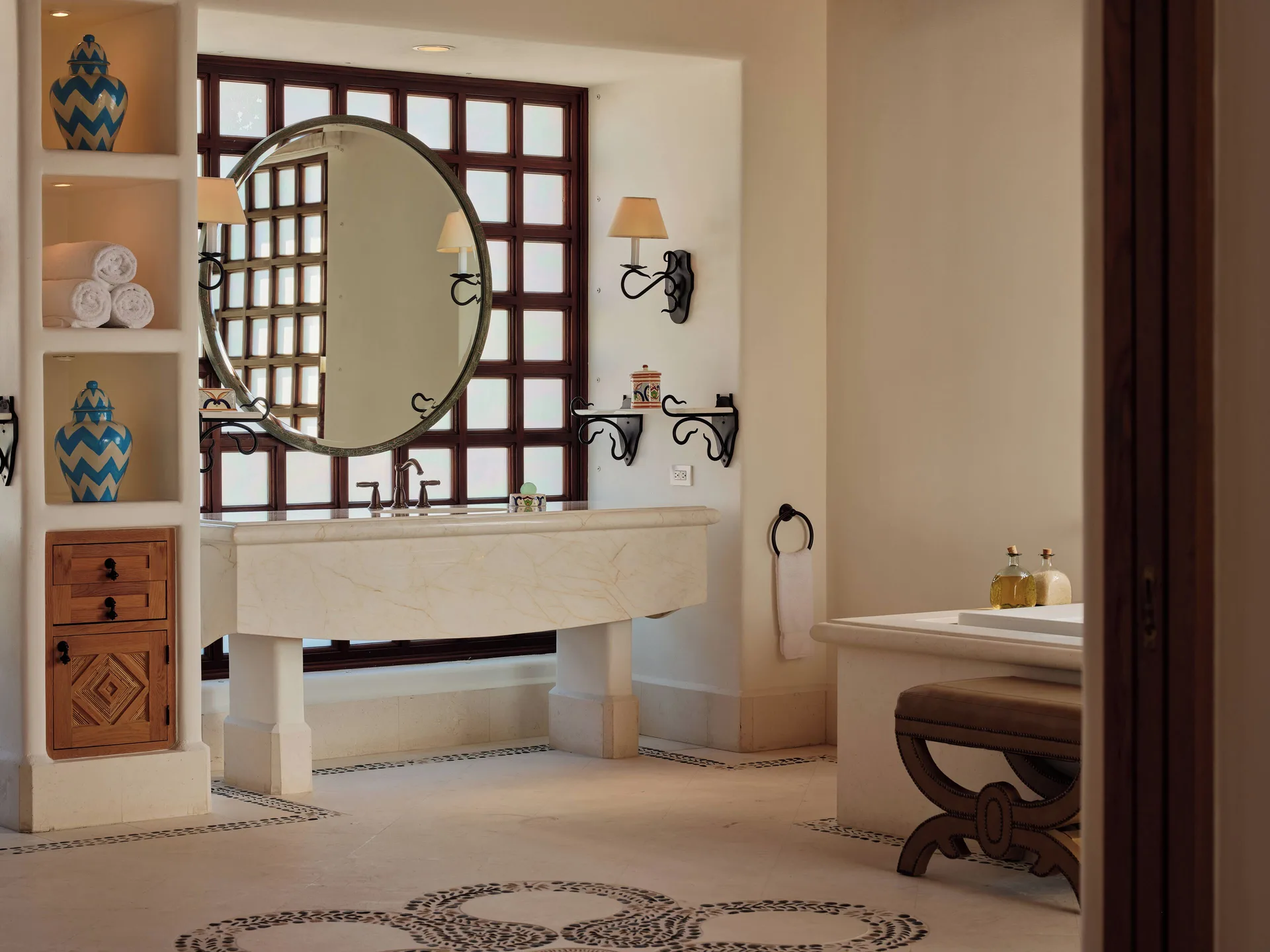 Spacious residence bathroom with double vanity and tub at Las Ventanas al Paraiso.