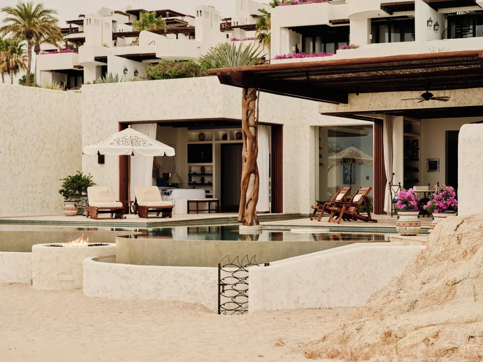Beachfront villa terrace with pool, pergola, and fire feature at Las Ventanas al Paraiso.