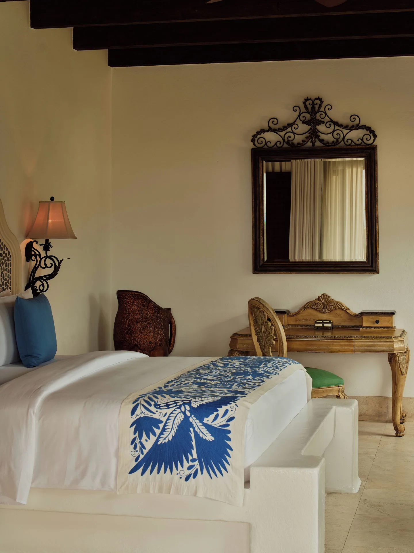 Bedroom with writing desk in a Two Bedroom Gardenview Residence at Las Ventanas al Paraiso.