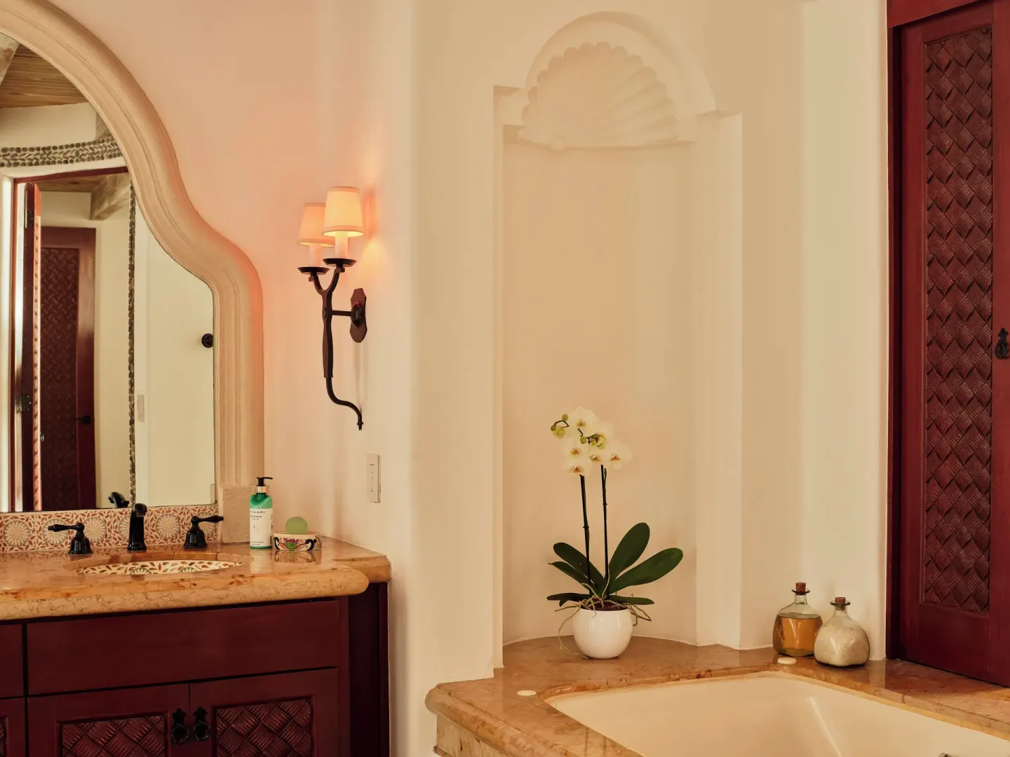 Bathroom vanity and tub in Two Bedroom Oceanview Penthouse Residence at Las Ventanas al Paraiso.