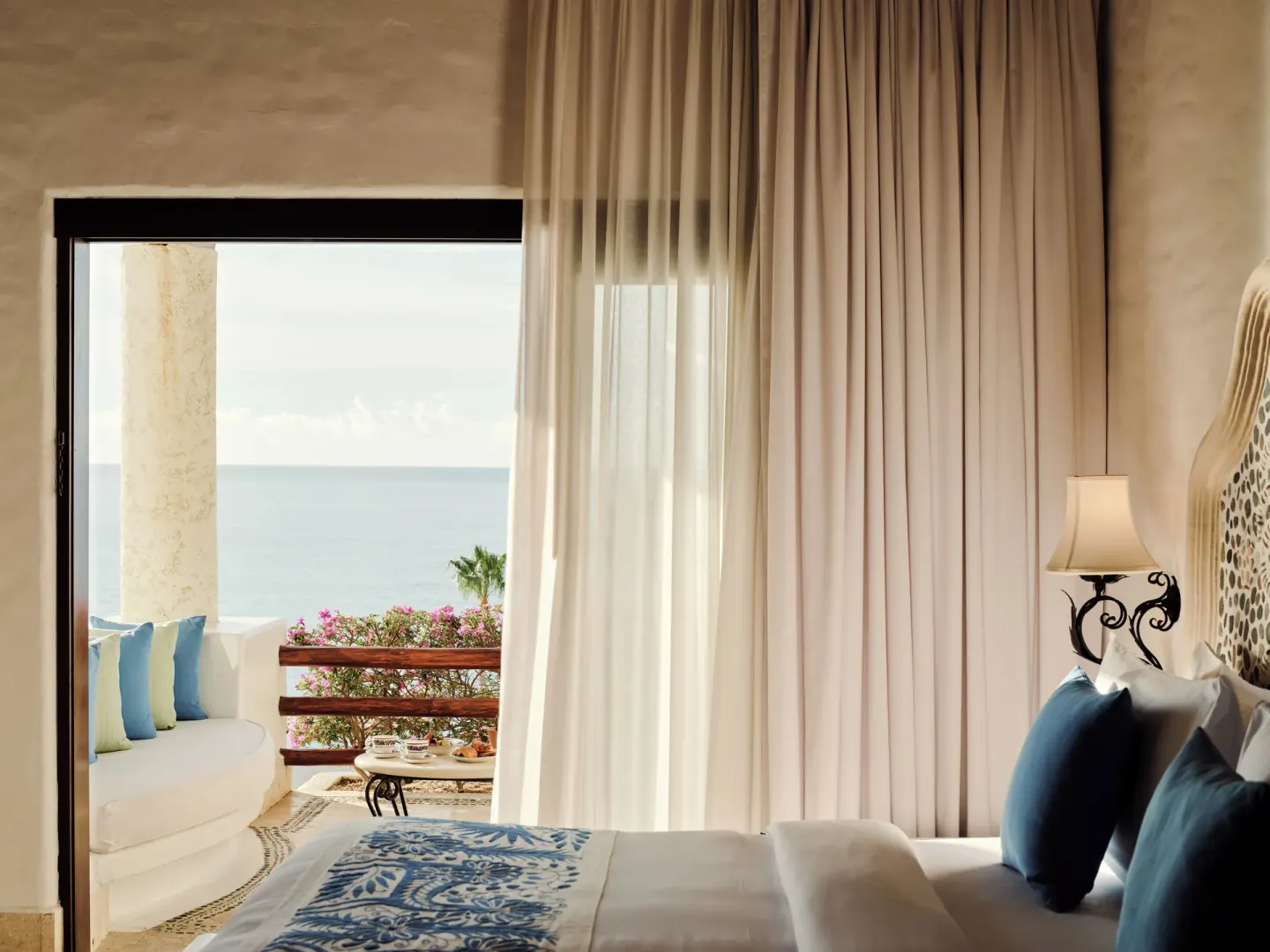 Oceanview bedroom with terrace seating at Las Ventanas al Paraiso.