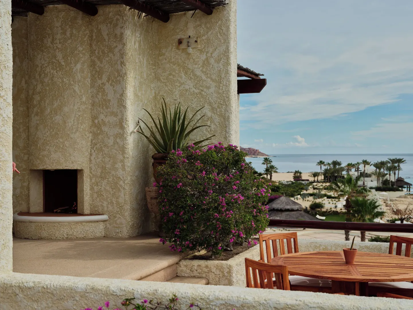Terrace fireplace and ocean view in Two Bedroom Oceanview Penthouse Residence at Las Ventanas al Paraiso.