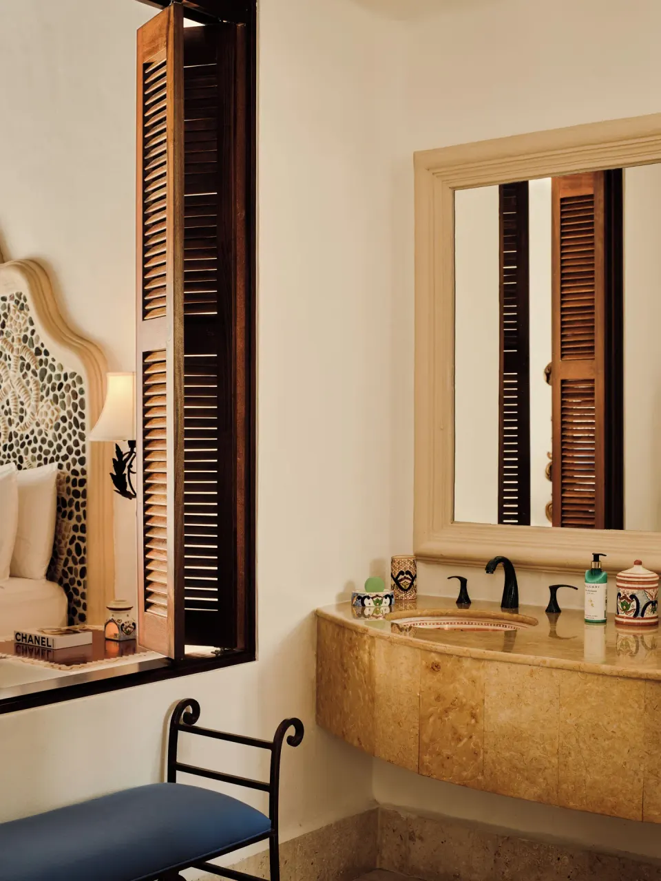 Bathroom vanity beside a bedroom window in the Two Bedroom Oceanview Residence at Las Ventanas al Paraiso.