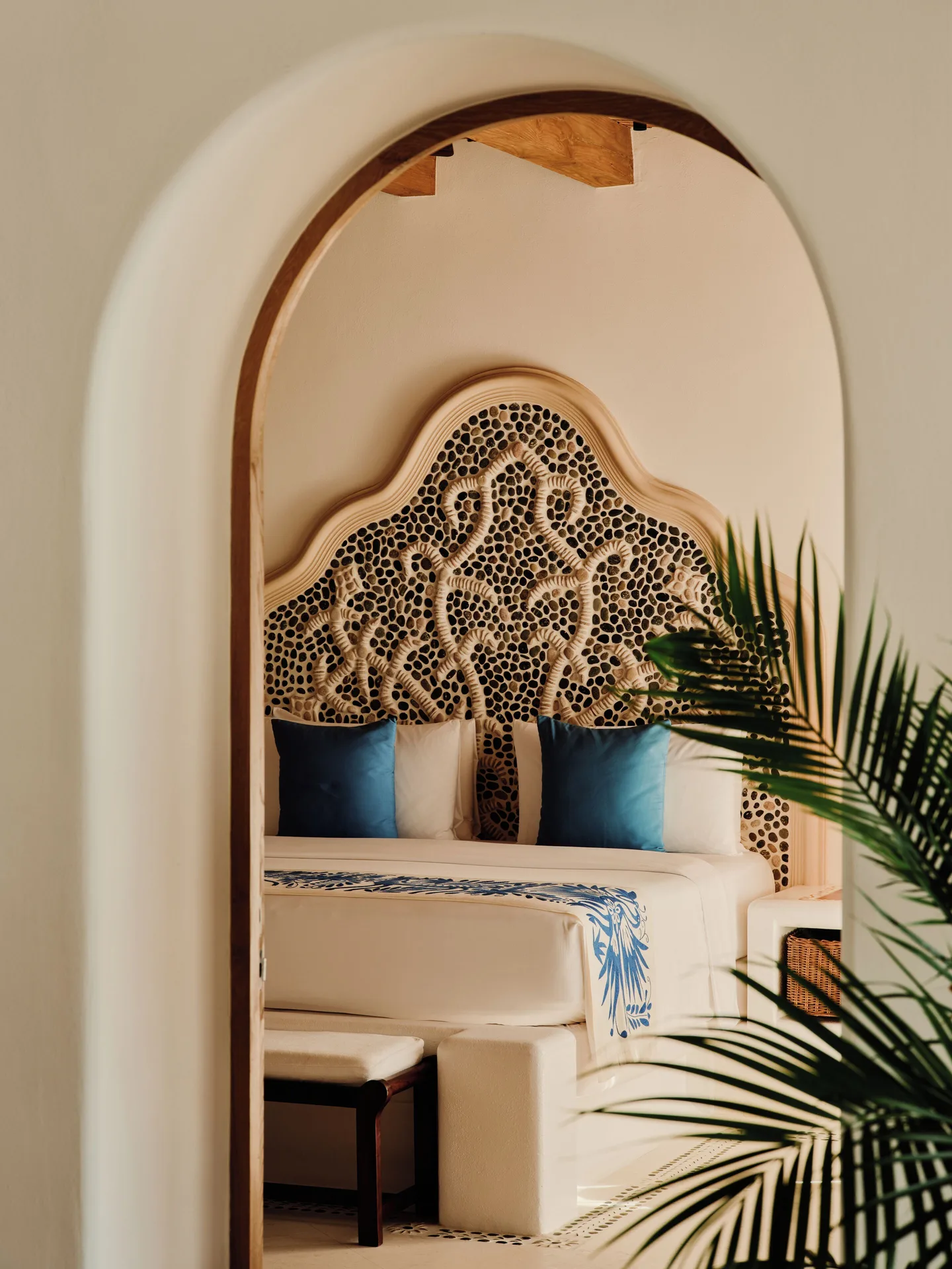 Arched view of a king bedroom in the Two Bedroom Oceanview Residence at Las Ventanas al Paraiso.