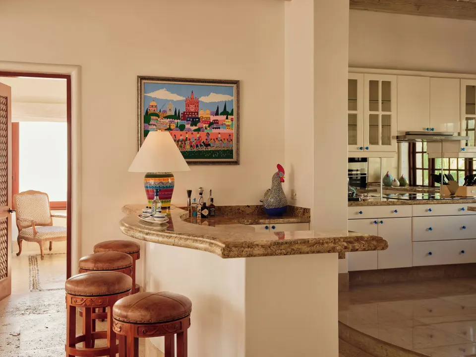 Bar counter and kitchen in the Two Bedroom Ty Warner Penthouse at Las Ventanas al Paraiso.