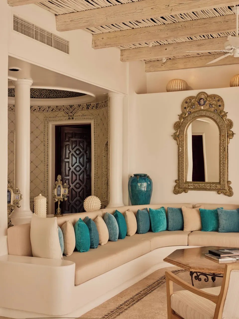 Curved lounge seating in the Two Bedroom Ty Warner Penthouse at Las Ventanas al Paraiso.