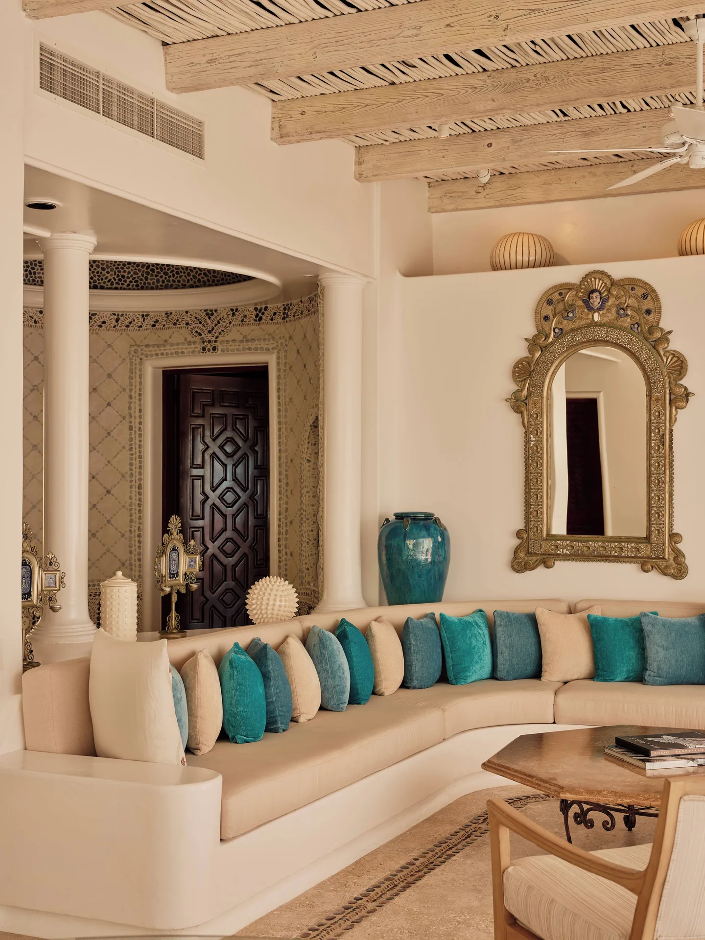 Curved lounge seating in the Two Bedroom Ty Warner Penthouse at Las Ventanas al Paraiso.