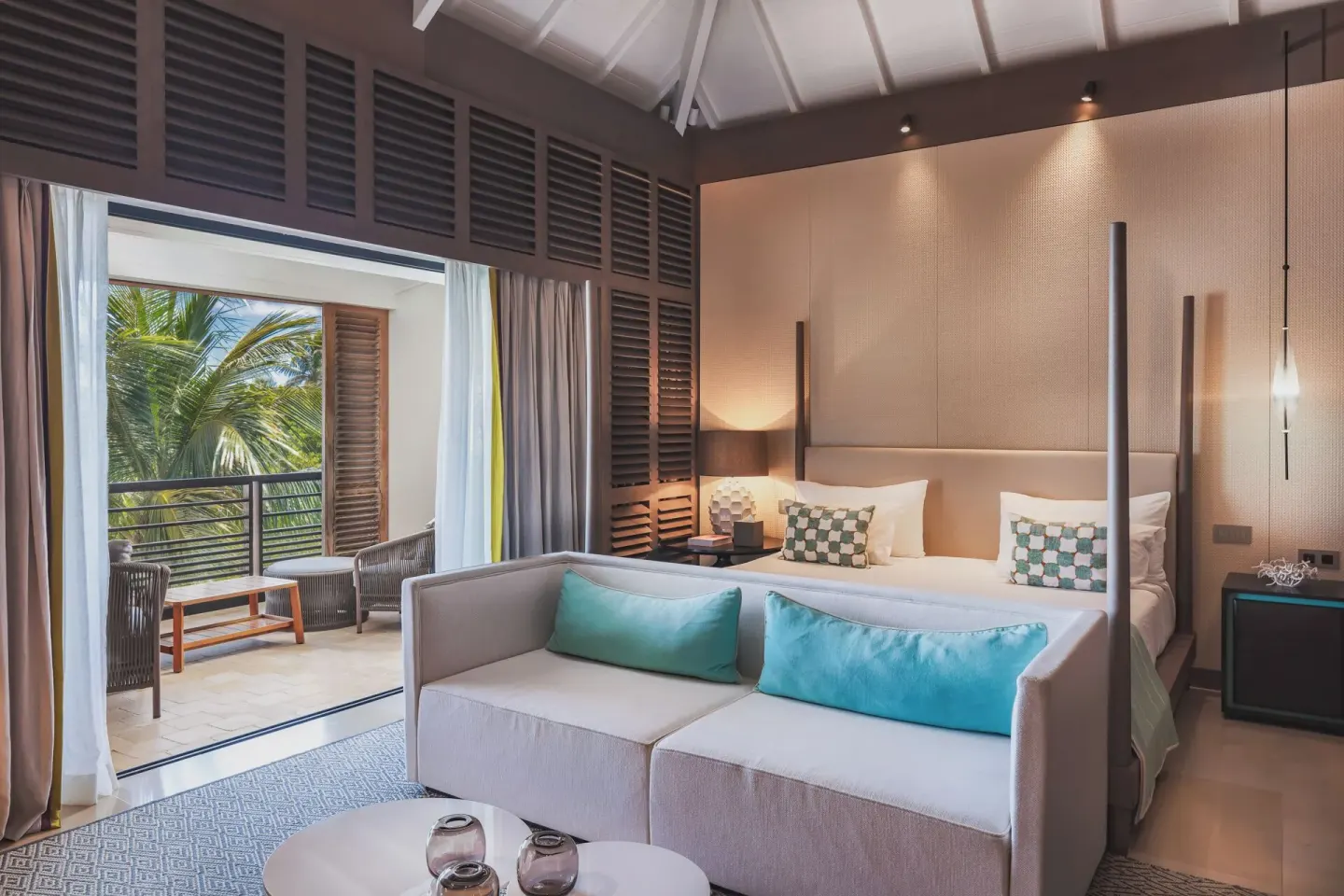 Ocean Signature Suite bedroom with king bed and open terrace at Le Barthélemy Hotel & Spa.
