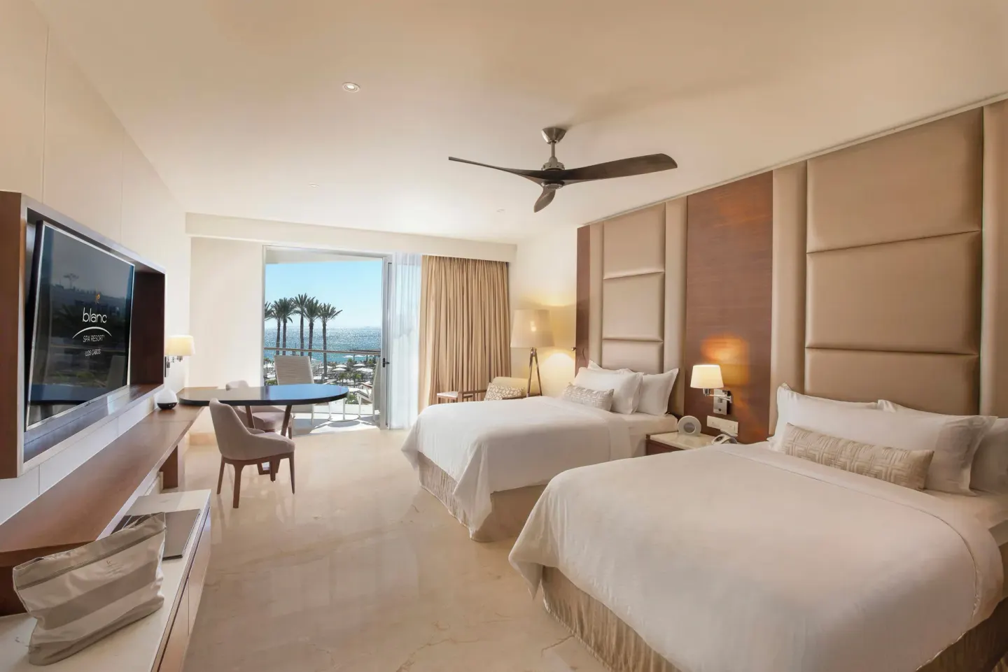 Royale Four Bedrooms Villa room with two beds and ocean balcony at Le Blanc Spa Resort Los Cabos.