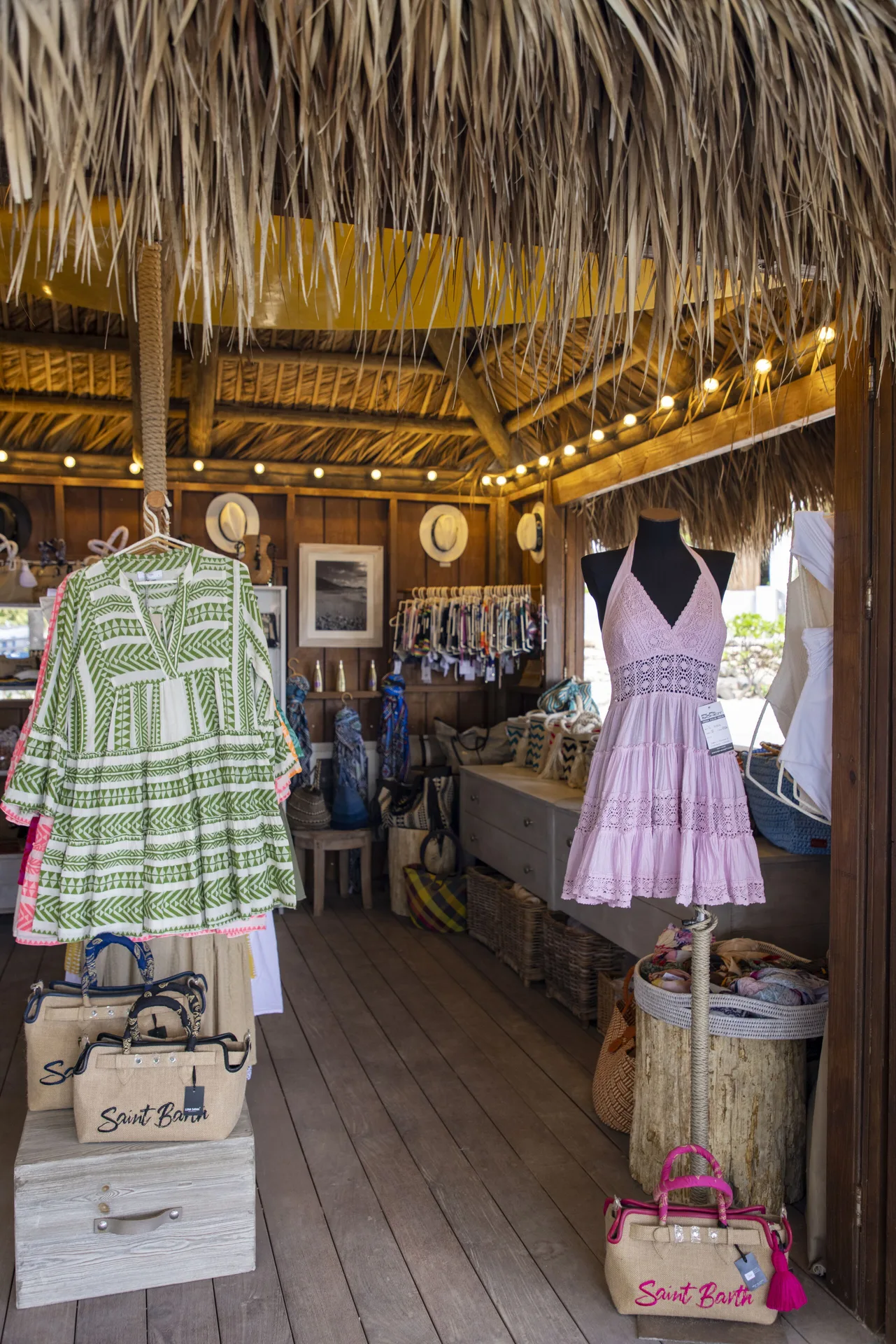 Boutique display with resort clothing and bags at Le Toiny Hôtel & Beach Club.