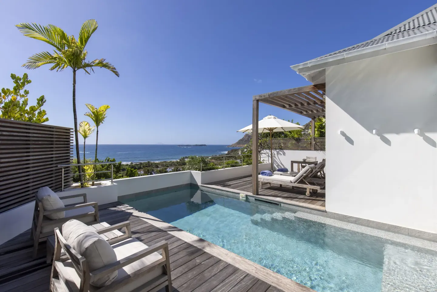Private plunge pool deck with ocean view at Le Toiny Hôtel & Beach Club.
