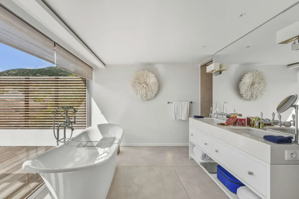 Duplex Spirit Suite bathroom with freestanding tub at Le Toiny Hôtel & Beach Club.