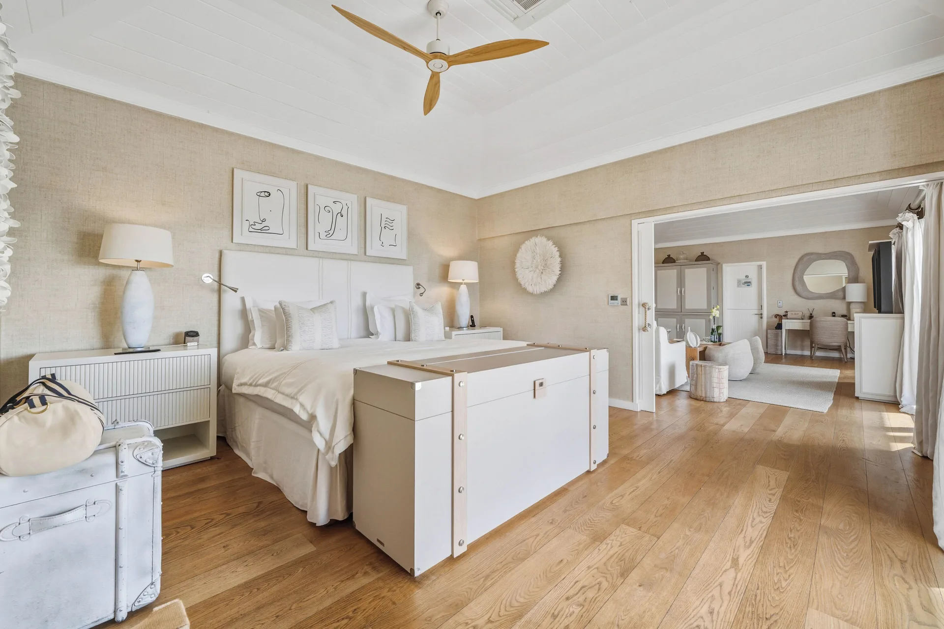 Signature Suite ocean view bedroom with a king bed at Le Toiny Hôtel & Beach Club.