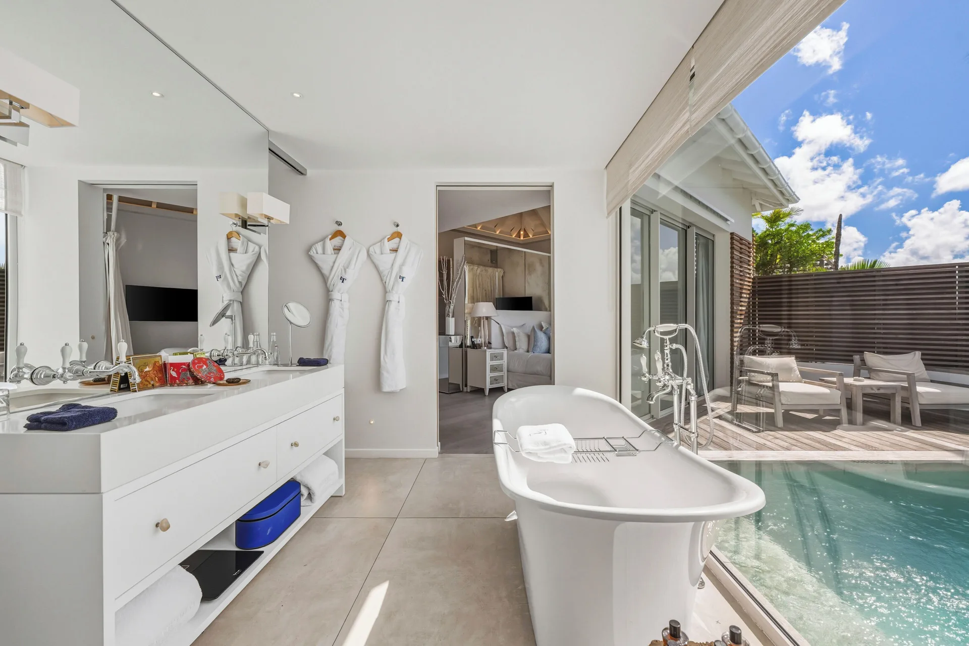 Spirit Suite bathroom with soaking tub beside the pool at Le Toiny Hôtel & Beach Club.