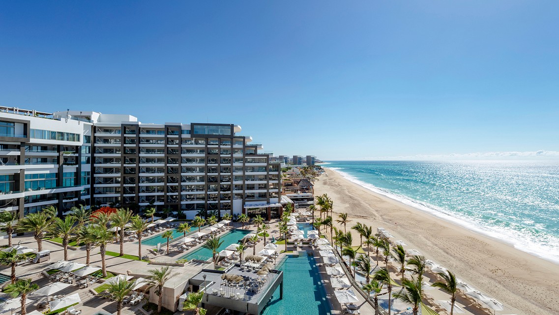 Garza Blanca Resort & Spa Los Cabos beachfront tower and infinity pools overlooking the Sea of Cortez.