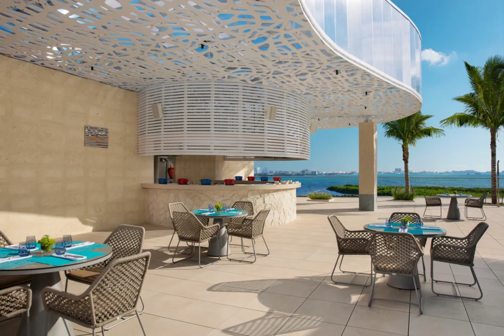 Bare Buns poolside bar at Breathless Cancun Soul with ocean views and outdoor seating