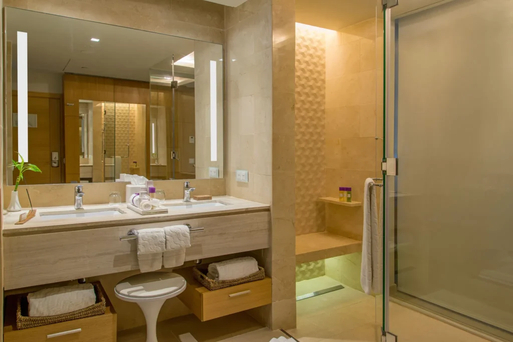Spacious bathroom inside the Allure Junior Suite Tropical View at Breathless Montego Bay with modern fixtures and glass shower.