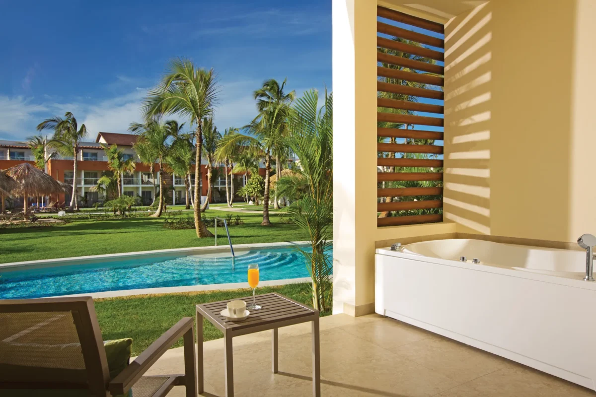 Allure Junior Suite Swim Up terrace with private hot tub and direct pool access at Breathless Punta Cana Resort.