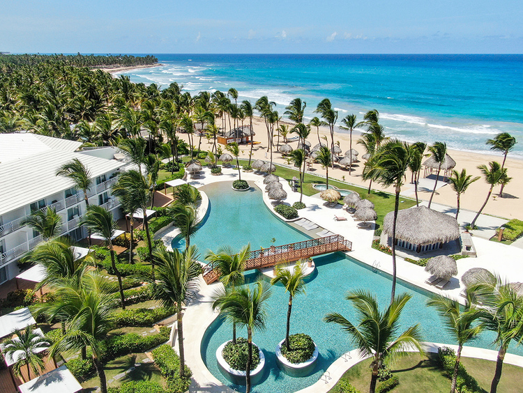 Excellence Punta Cana adults-only all-inclusive resort with pristine beach, luxury suites, and romantic ambiance in the Dominican Republic.