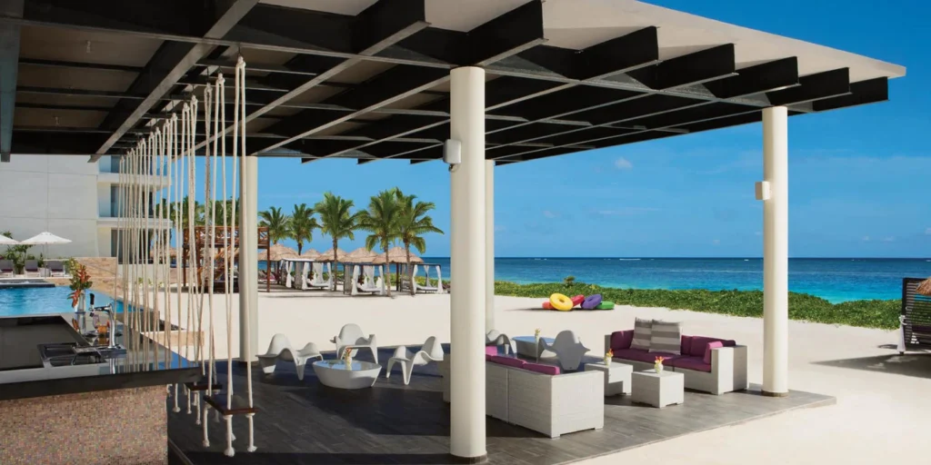 Foam Bar cocktail hour venue at Breathless Riviera Cancun overlooking the beach and ocean