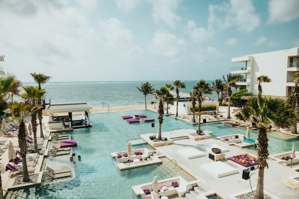 Energy pool and swim-up bars at Breathless Riviera Cancun resort