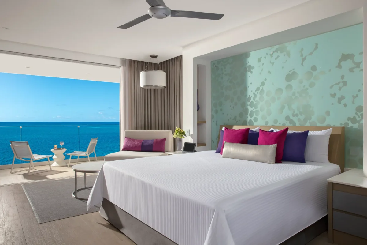 Xhale Club Junior Suite Ocean Front at Breathless Riviera Cancun showcasing direct ocean views, modern furnishings, and upscale Xhale Club design.
