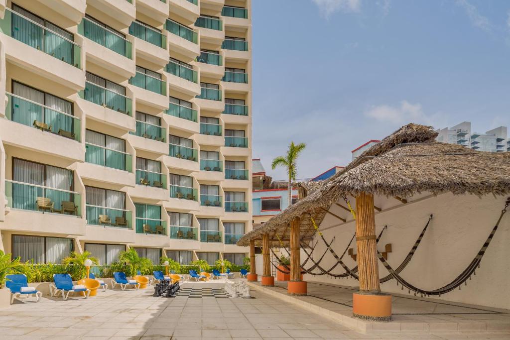 Gamma Acapulco Copacabana Beach Hotel budget-friendly beachfront property on Acapulco's Costera with ocean views and basic amenities.