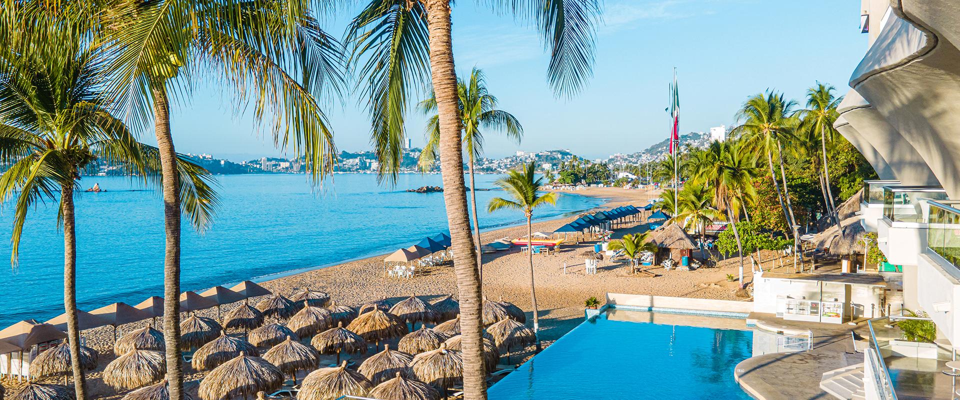 Krystal Beach Acapulco all-inclusive hotel with beachfront pools and ocean views.