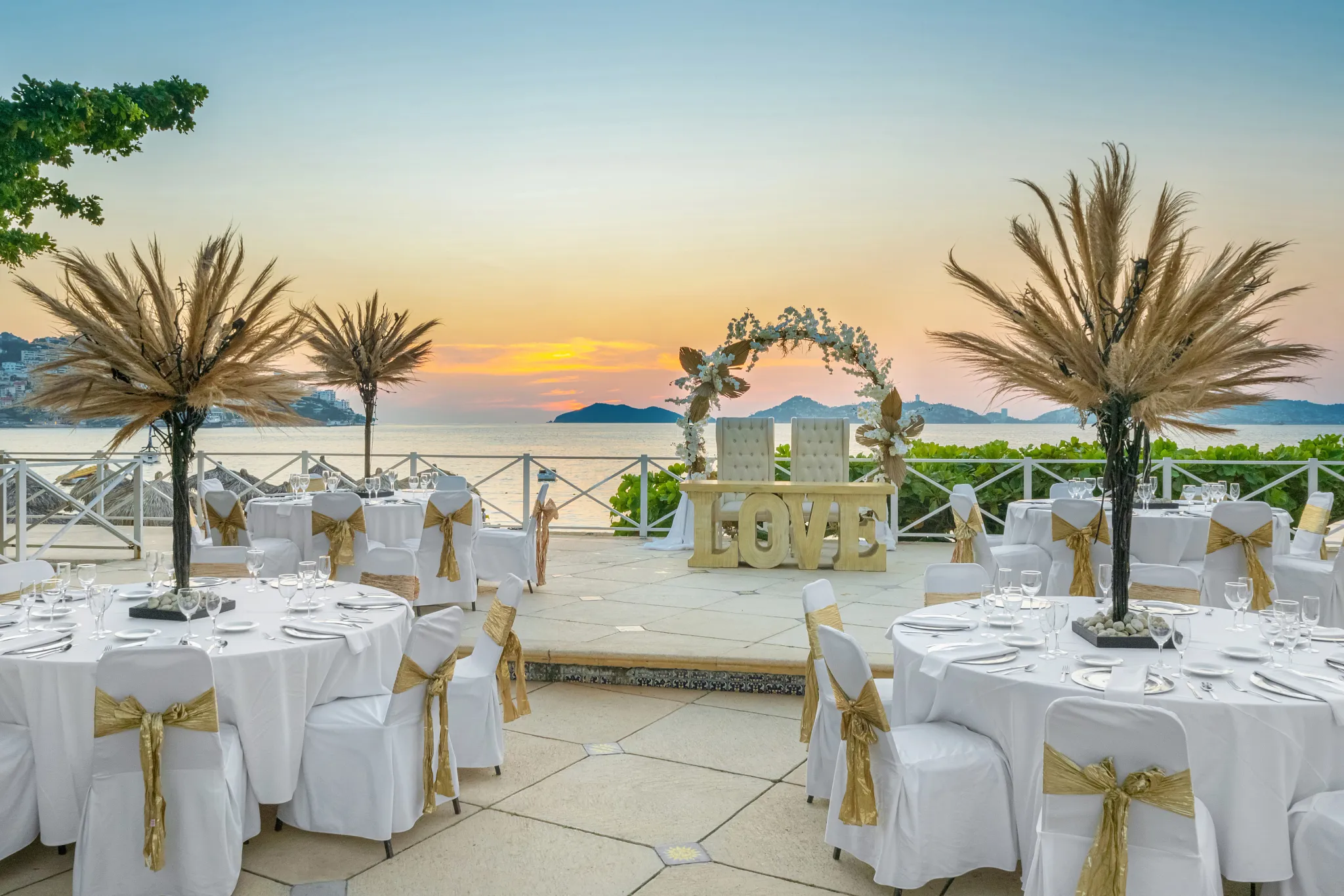 Oceanfront wedding reception venue at Dreams Acapulco Resort & Spa with elegant dining setup