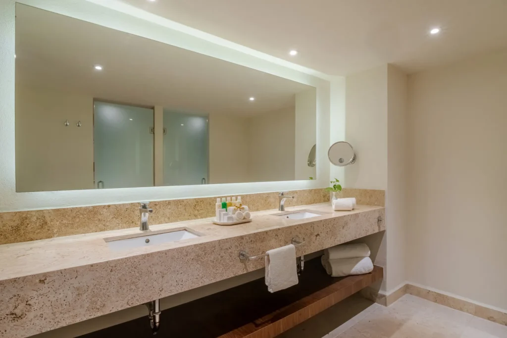 Preferred Club Junior Suite Ocean Front bathroom with double vanity at Dreams Acapulco Resort & Spa.