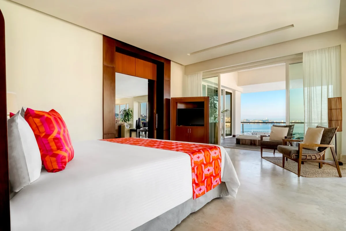 Preferred Club Presidential Three-Bedroom Ocean Front king bedroom at Dreams Acapulco Resort & Spa.