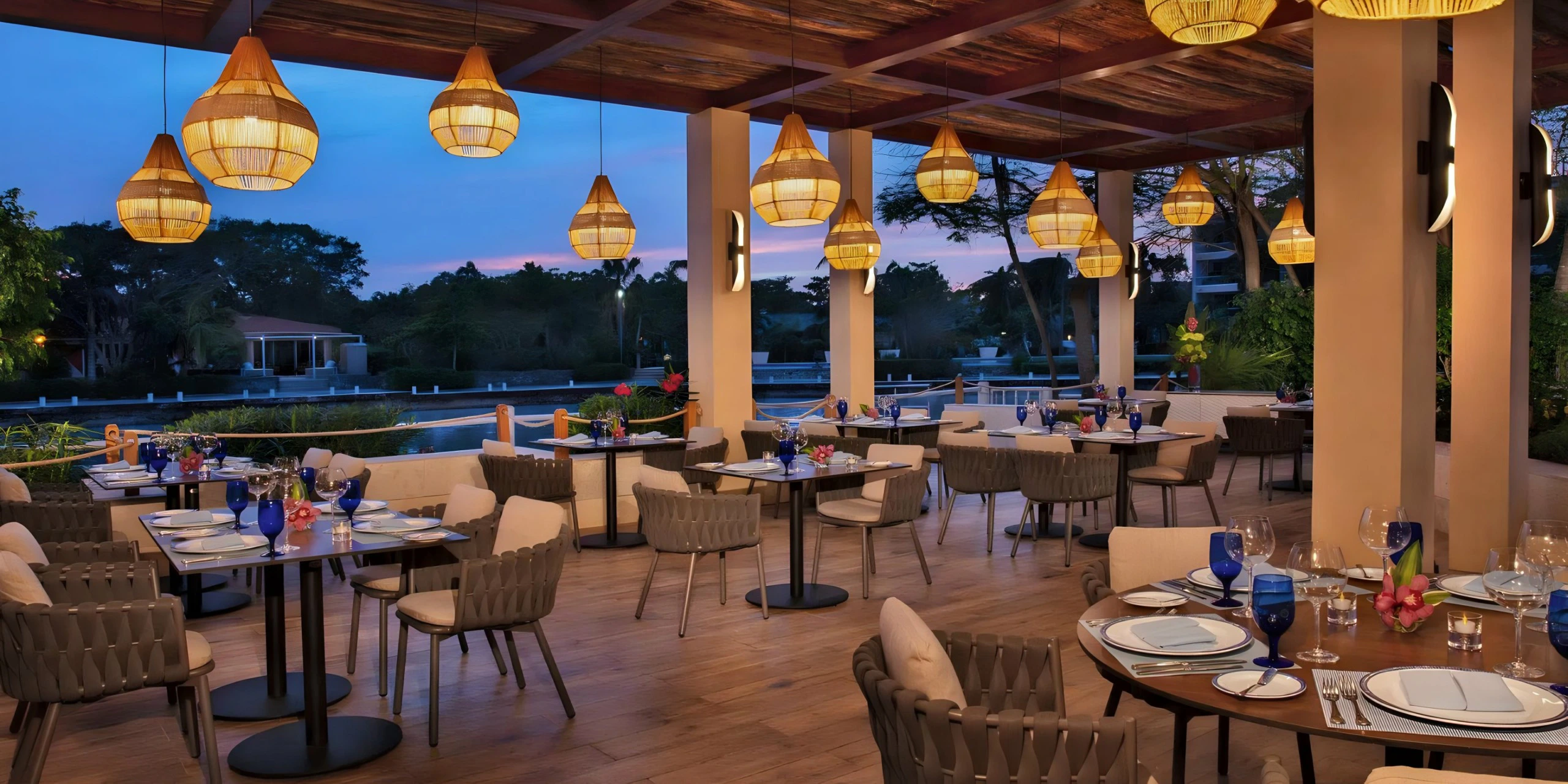Oceana restaurant terrace setup for evening events at Dreams Aventuras Riviera Maya