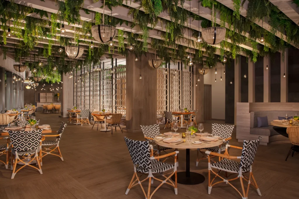 Portofino restaurant at Dreams Bahia Mita Surf & Spa Resort featuring elegant Italian cuisine, romantic ambiance, and upscale dining décor.