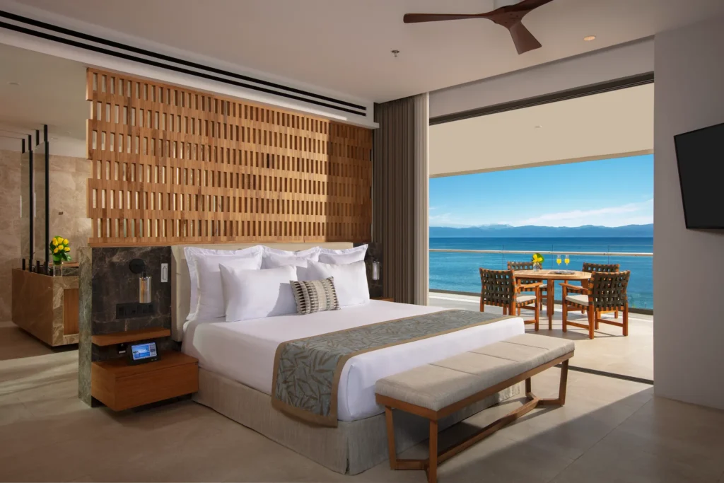 Preferred Club Bahia Mita Suite Ocean View king bedroom with terrace at Dreams Bahia Mita Resort.