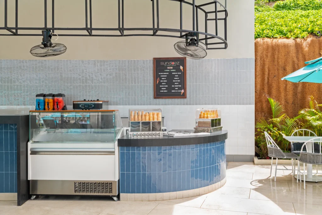 Sundaez dessert shop at Dreams Bahia Mita Surf & Spa Resort featuring ice cream sundaes, sweet treats, and a colorful casual setting.
