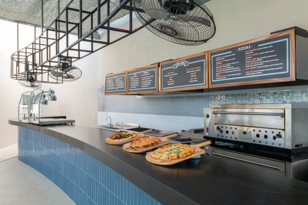 Tides restaurant at Dreams Bahia Mita Surf & Spa Resort featuring oceanfront dining, fresh seafood cuisine, and an elegant coastal atmosphere.